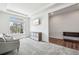 Bright and airy living space with modern decor, stylish furniture, and a view of the neighborhood at 16595 E 110Th Ave, Commerce City, CO 80022