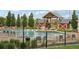 Outdoor pool area with lounge chairs and a picnic pavilion at 16595 E 110Th Ave, Commerce City, CO 80022