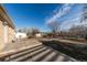 This backyard has a large concrete patio at 3288 W Tufts Ave, Englewood, CO 80110