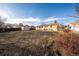 This backyard has a storage shed, grass, and a brick home at 3288 W Tufts Ave, Englewood, CO 80110