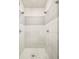 Modern bathroom shower features double shower heads and elegant tiling at 1333 Raleigh St, Denver, CO 80204
