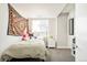 Cozy bedroom with large window and stylish decor at 1333 Raleigh St, Denver, CO 80204