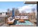 Outdoor deck featuring patio seating, a coffee table, an outdoor rug, and scenic views at 1333 Raleigh St, Denver, CO 80204