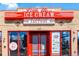 The Little Personal Ice Cream Factory shows vintage neon signs and red window trim at 1333 Raleigh St, Denver, CO 80204