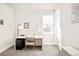 Bright office space features a large window and contemporary furniture at 1333 Raleigh St, Denver, CO 80204