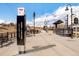 Exterior view of Perry Station with signage and transit platform on a sunny day at 1333 Raleigh St, Denver, CO 80204