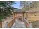 Picturesque gazebo with seating area, offering a peaceful retreat with scenic views at 127 Granite Way, Evergreen, CO 80439