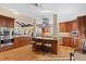 Spacious kitchen featuring stainless steel appliances, a center island, and ample cabinet space at 127 Granite Way, Evergreen, CO 80439