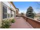 The deck is the perfect spot for enjoying outdoor living with open views and a well-maintained backyard at 10650 Ashfield St, Highlands Ranch, CO 80126