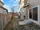 Small backyard with patio and wooden fence at 10094 Wyandott Cir, Denver, CO 80260