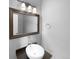 Clean bathroom with a modern vanity and a large mirror at 10094 Wyandott Cir, Denver, CO 80260