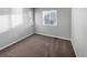 Bright bedroom with neutral walls and carpet at 10094 Wyandott Cir, Denver, CO 80260