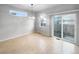 Bright dining room featuring hardwood floors and backyard access at 10094 Wyandott Cir, Denver, CO 80260