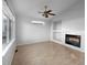 Living room with hardwood floors and a fireplace at 10094 Wyandott Cir, Denver, CO 80260