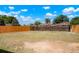 Large, fenced backyard offers plenty of space for outdoor activities and entertainment at 5554 Crystal Way, Denver, CO 80239