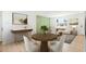 Dining room with modern furnishings, decor, and bright light coming from the Living Room at 5554 Crystal Way, Denver, CO 80239