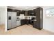 Modern kitchen featuring stainless steel appliances, new countertops, and freshly painted cabinets at 5554 Crystal Way, Denver, CO 80239