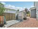 Backyard with storage shed and gravel ground cover offers practical outdoor space at 19707 E Caspian Cir, Aurora, CO 80013