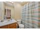 Cozy bathroom with classic sink, toilet and tub at 19707 E Caspian Cir, Aurora, CO 80013