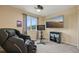 Relaxing bonus room with massage chair and fan cave decor at 19707 E Caspian Cir, Aurora, CO 80013
