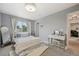 Bedroom with ample sunlight, desk and a cozy chair at 19707 E Caspian Cir, Aurora, CO 80013
