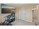 Bonus room includes a television and closet at 19707 E Caspian Cir, Aurora, CO 80013