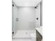 Modern bathroom with glass-enclosed shower and stylish fixtures at 6211 W Fremont Pl, Littleton, CO 80128