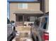 Charming townhome displaying neutral siding, shaded porch and dark window trim, offering comfort and curb appeal at 473 N Banner St # D, Elizabeth, CO 80107