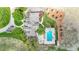 Aerial view of estate showcasing lush landscaping, pool, and outdoor entertaining area at 7818 S Zeno St, Centennial, CO 80016