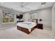 Spacious bedroom featuring large windows, natural light, and neutral color scheme at 7818 S Zeno St, Centennial, CO 80016