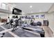 Finished basement gym with treadmills and other exercise equipment at 7818 S Zeno St, Centennial, CO 80016