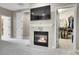 Main bedroom featuring a fireplace and access to a walk-in closet at 7818 S Zeno St, Centennial, CO 80016