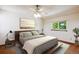 Serene bedroom featuring modern furniture, natural light, and minimalist décor at 984 Shadow Mountain Dr, Highlands Ranch, CO 80126