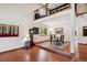Open-concept dining area with hardwood floors and elegant decor at 984 Shadow Mountain Dr, Highlands Ranch, CO 80126