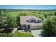 Charming two-story home with well-manicured lawn, mature trees, and three car garage at 984 Shadow Mountain Dr, Highlands Ranch, CO 80126