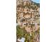 Aerial view showcases the home, surrounding landscape, and private driveway at 248 Copperdale Ln, Golden, CO 80403