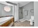 Bathroom featuring a tub, shower and toilet with tile floors at 248 Copperdale Ln, Golden, CO 80403