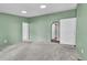 Light-green bedroom boasts an ensuite bathroom with a sliding barn door at 248 Copperdale Ln, Golden, CO 80403