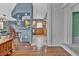 The kitchen features stainless steel appliances, wooden cabinets, and a breakfast bar at 248 Copperdale Ln, Golden, CO 80403