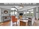 Bright living room featuring vaulted ceilings, large windows with mountain views and hardwood flooring at 248 Copperdale Ln, Golden, CO 80403