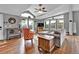 Bright living room with vaulted ceilings, mountain views, hardwood floors, and comfortable seating at 248 Copperdale Ln, Golden, CO 80403