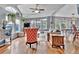 Inviting living room with large windows, hardwood floors, high ceilings, and comfortable seating arrangements at 248 Copperdale Ln, Golden, CO 80403