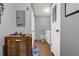 Mud room features a utility sink, overhead lighting, and wood flooring at 248 Copperdale Ln, Golden, CO 80403