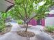 Exterior view of the entrance to building, featuring trees and walkway at 2501 15Th St # 3D, Denver, CO 80211