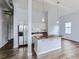 Modern kitchen features stainless steel appliances and a stylish breakfast bar with pendant lighting at 2501 15Th St # 3D, Denver, CO 80211