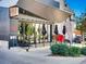 Modern restaurant exterior with large windows, sleek awnings, and inviting outdoor seating area at 2501 15Th St # 3D, Denver, CO 80211
