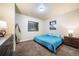 Bedroom with king-size bed, nightstands, and dresser at 6829 Juniper Ct, Frederick, CO 80530