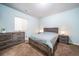 Bedroom with queen-size bed, nightstands, and dresser at 6829 Juniper Ct, Frederick, CO 80530