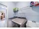 Laundry room with washer, dryer, and shelving at 6829 Juniper Ct, Frederick, CO 80530