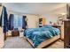 Standard bedroom with lots of natural light, and neutral colored carpet at 18193 E Kentucky Ave # 203, Aurora, CO 80017